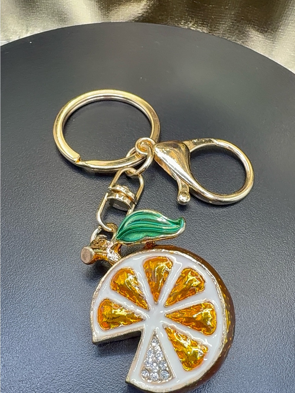 Gold-Tone Orange Slice Keychain with Green Leaf Charm - Unbranded